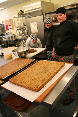 The work is inspected after baking